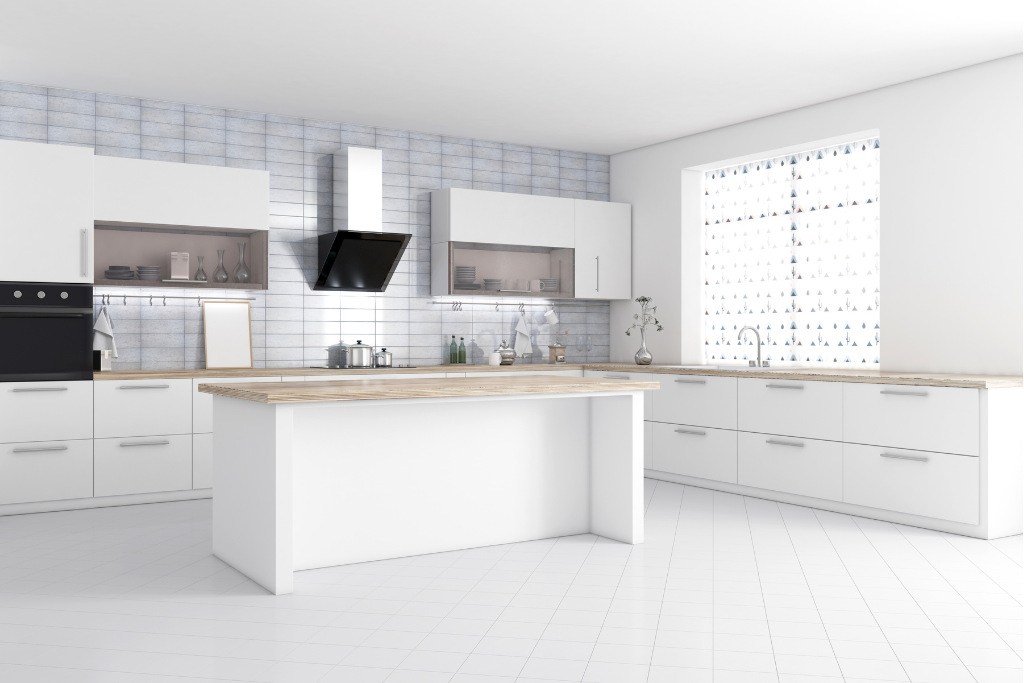 Modern white kitchen with large island and black range hood